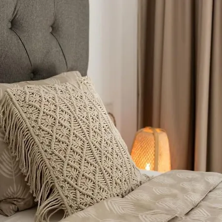 The Cozy At One80 Suites, *