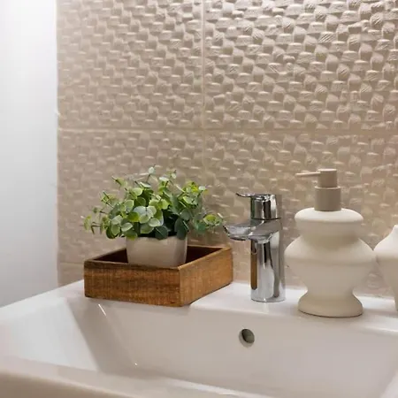 The Cozy At One80 Suites, *